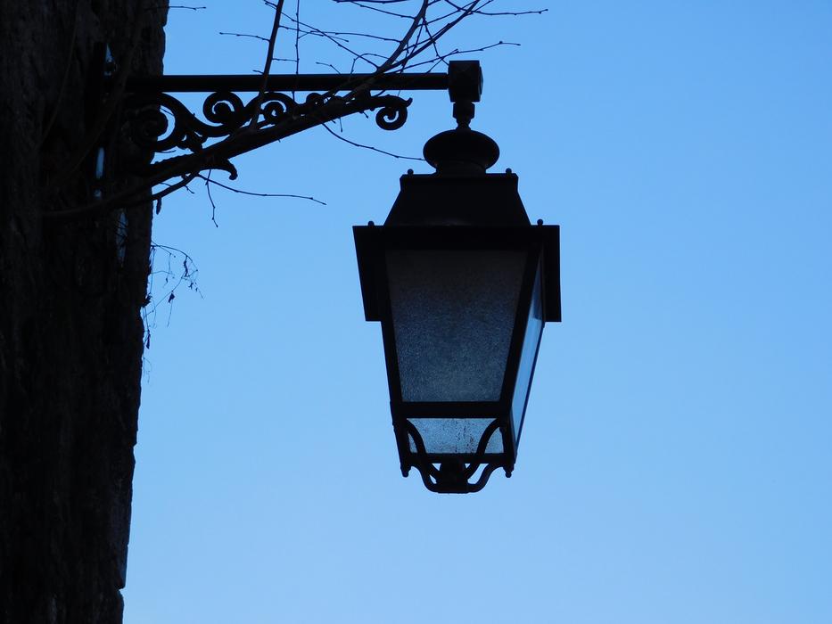 Hanging lantern on a house in the evening