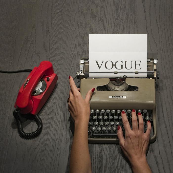 typewriter and human hands