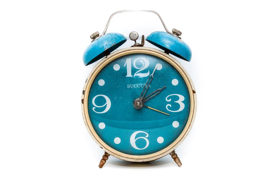 blue alarm clock with big numbers