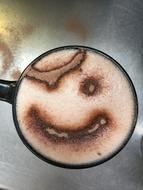 funny face in a coffee drink