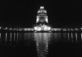 Black and white of the beautiful VÃ¶lkerschlachtdenkmal with lights at night, in Leipzig, Germany