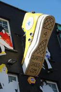 yellow sneaker sculpture
