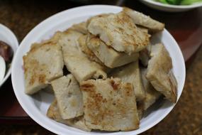 fried bread on a plate