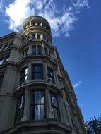 photo of modern high-rise building with bay window