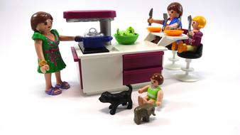 Family figures in the kitchen