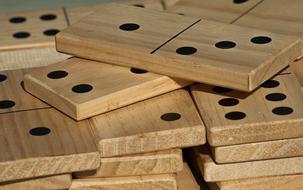 wooden playing dominoes