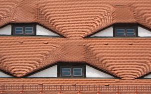 roof windows on the facade of a house in saxony