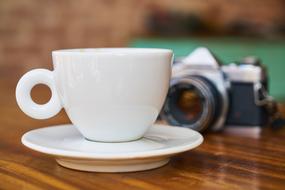 white mug next to the camera