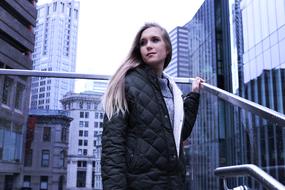 girl among skyscrapers in downtown boston