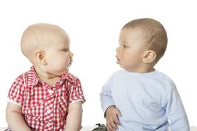 two children look at each other