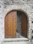 wooden entrance door to medieval castle in switzerland