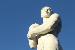 marble statue against a clear blue sky