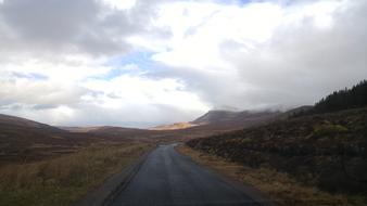 road leading into the fog