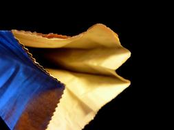 cardboard bag on black background