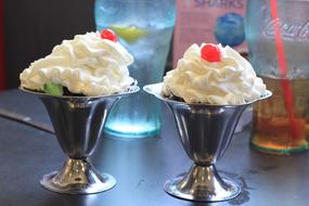 cream dessert with berries