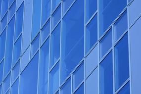 building facade with blue windows close up