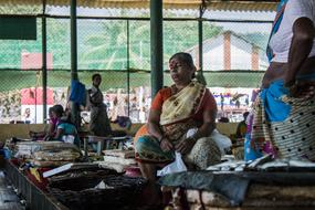 woman selling fish