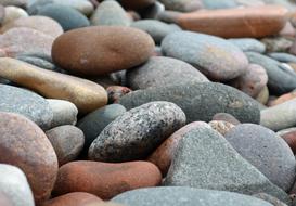 macro photo of large pebbles on the seashore