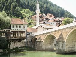 arched bridge near the city