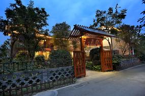 cozy archway by the house