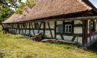 cozy house in the village by the grass