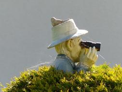 Binoculars man garden figure Bush