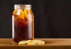 iced tea with lemon in a jar