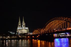 the bridge with the building glowing