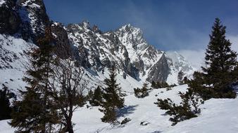 mountainous terrain with snow