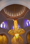 gold luxurious chandelier in the temple