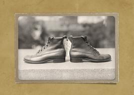 black and white retro photo of leather shoes