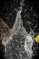 splash of clear water with fruit