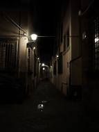 a dark alley in the light of the nights