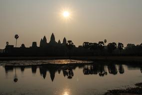 silhouette of the old city under the sun