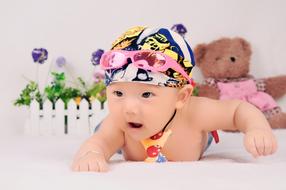cute kid with a hat and glasses