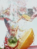 splashing water with fruit