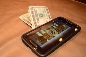 phone with a bitcoin image