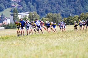 people on roller skates pass through the field