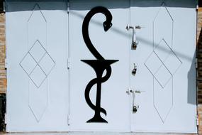 pharmacy symbol on the door