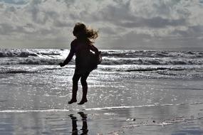 Sea Girl Jumping In Water