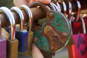 rusty lock on a green background