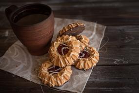 Clay cup and cookies