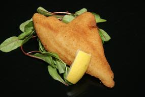 piece of fish with vegetables