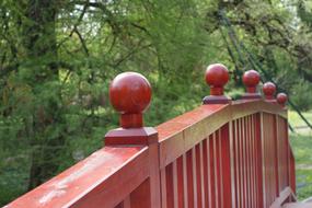 wooden railing by the bridge