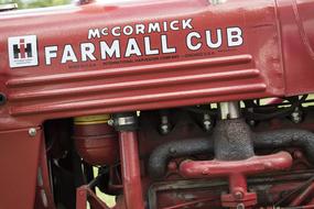 inscription on the old red tractor