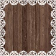 lace frame on wooden background