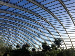 blue sky through the glass modern roof