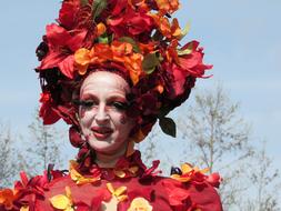 girl with festive makeup in costume