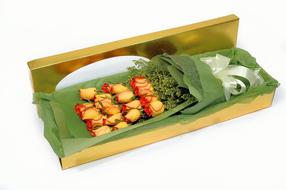colorful bouquet of flowers in a box