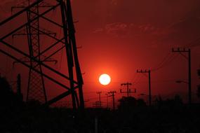 red sun over the city at night